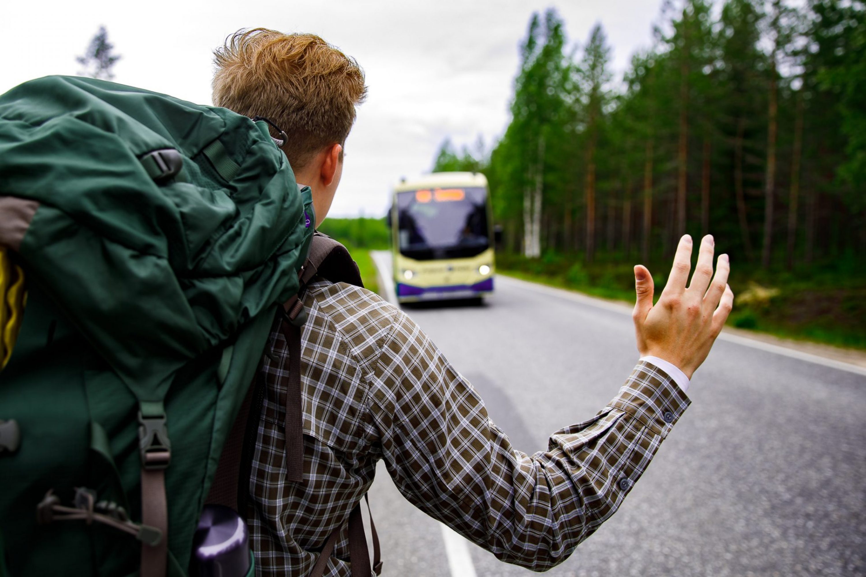 A man waiting for a bus