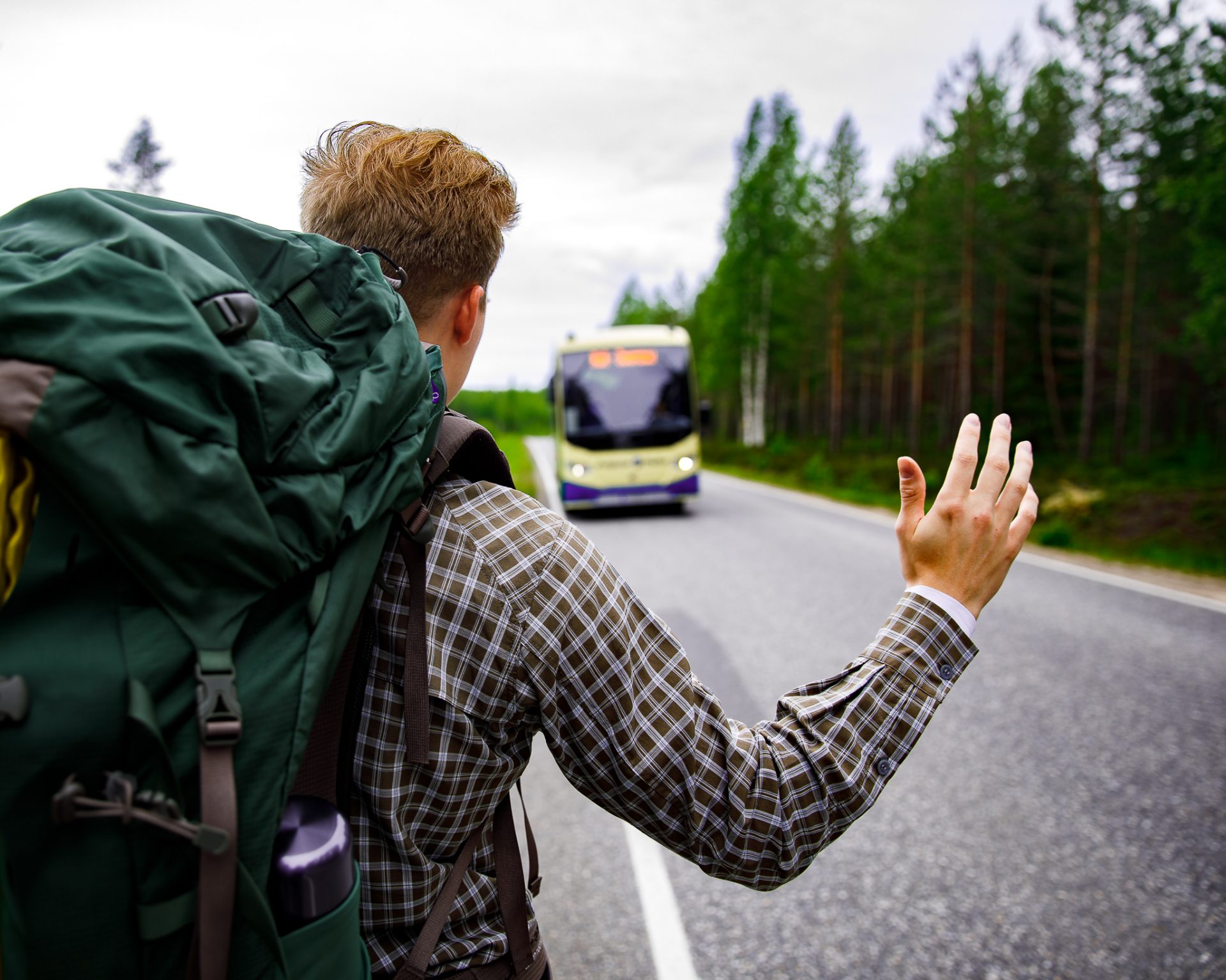 A man waiting for a bus