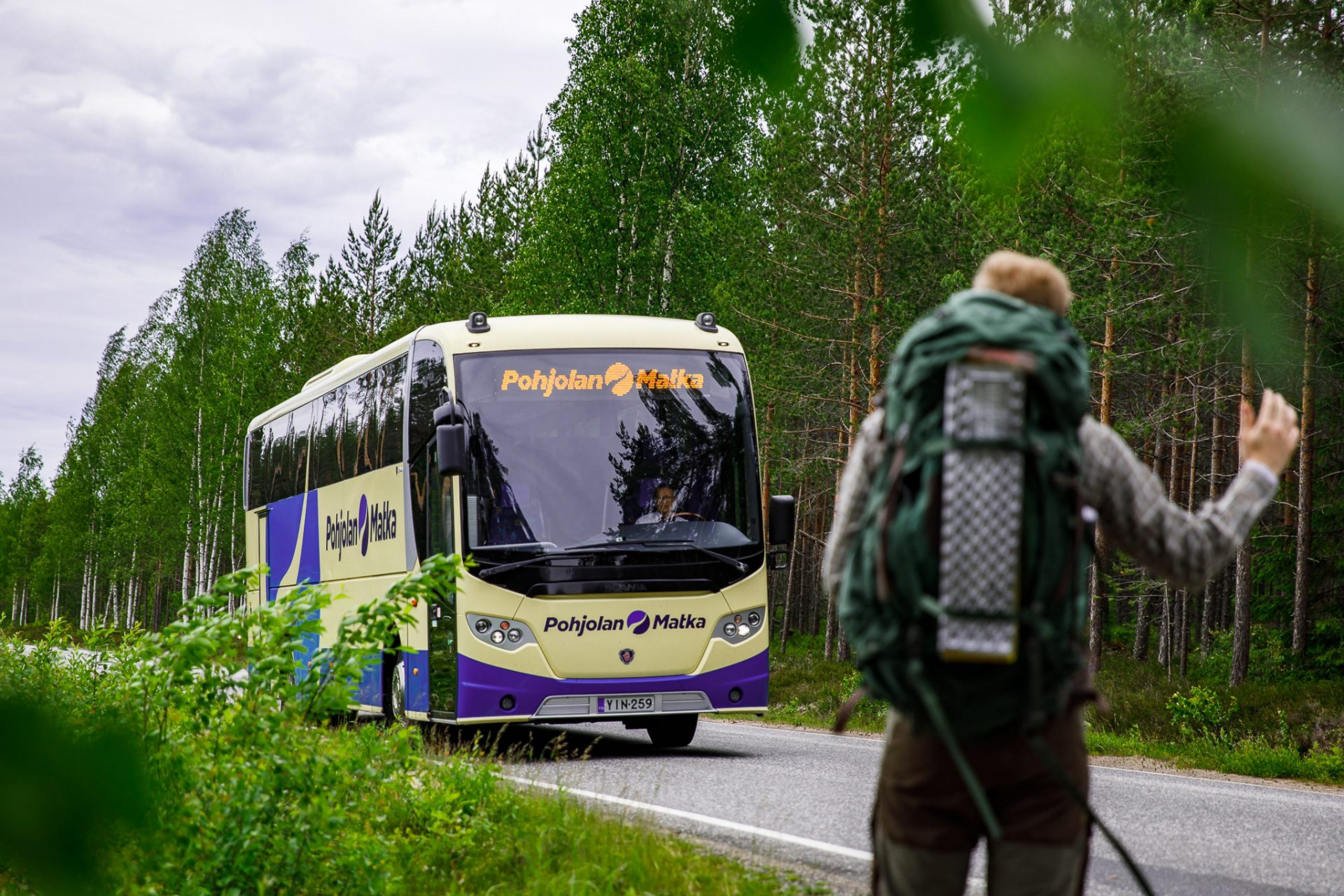 A man waiting for a bus